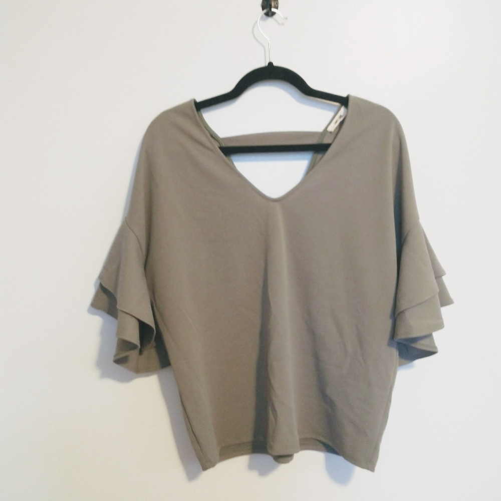 First love green top with ruffle full sleeves and v neck in the front and back,